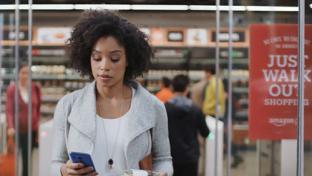 woman leaving Amazon Go store